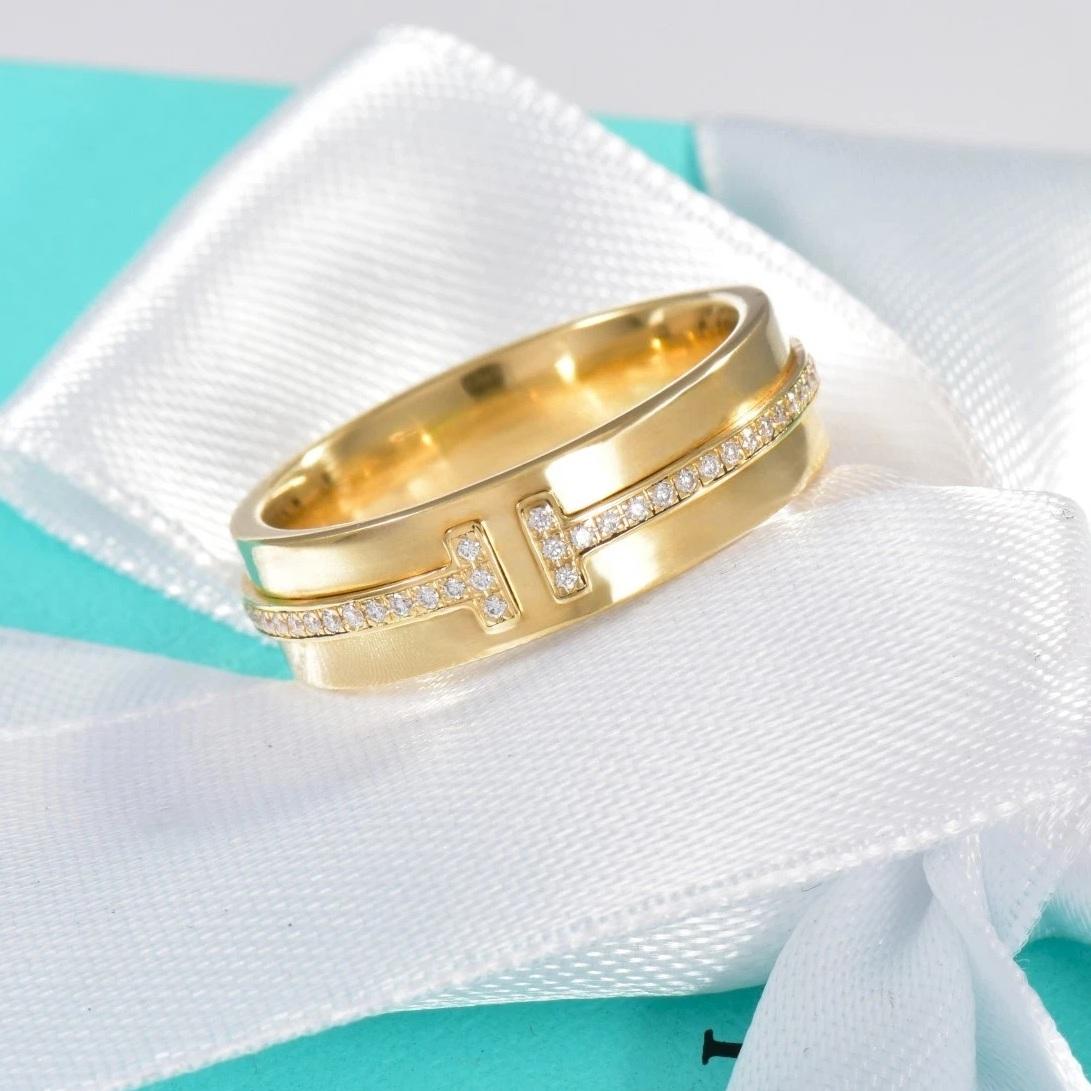da uomo o donna TIFFANY & Co. Anello a T con diamante largo 5,5 mm in oro 18 carati 7 in vendita