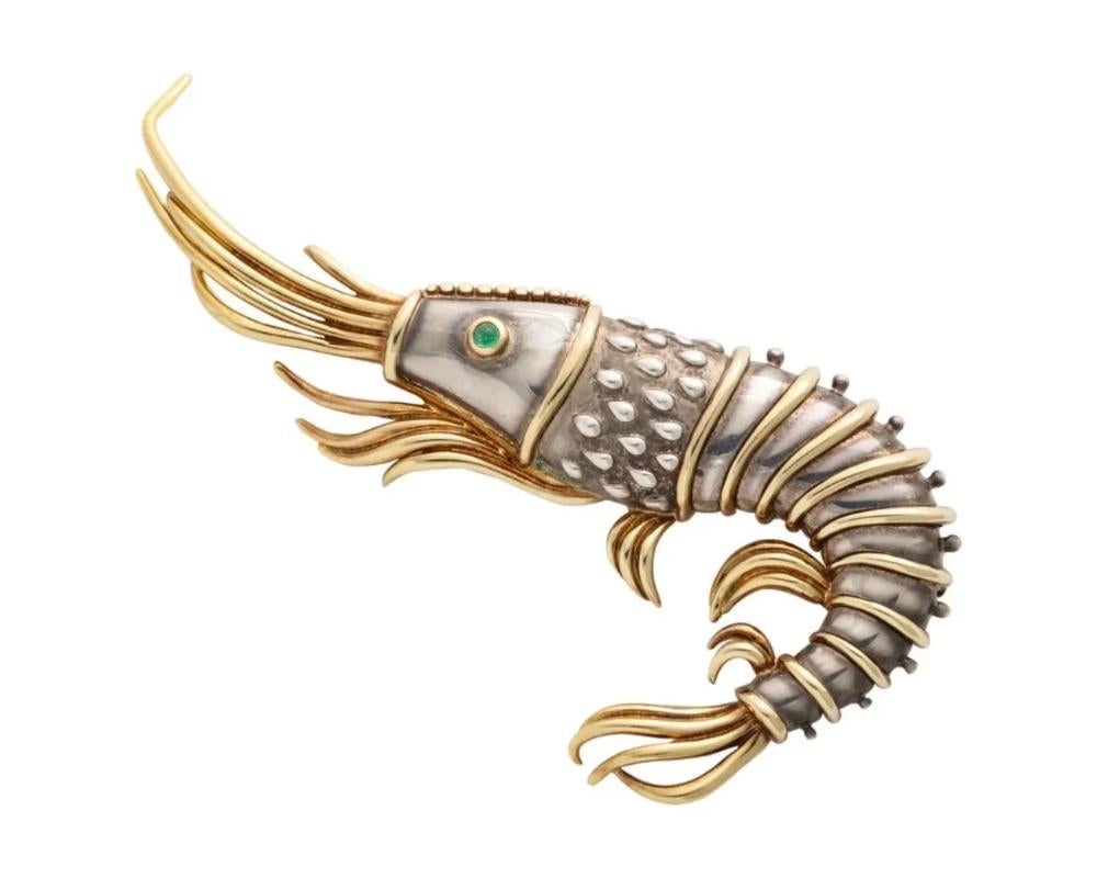 Tiffany & Co. 18K Gold And 925 Silver Lobster Shrimp Pin / Brooch With Emerald,

Signed Tiffany & Co. and 925

Approx: 20.7 dwts.

Measures: approx. 3 1/2 x 1 3/4 inches

Due to the item's age do not expect items to be in perfect condition and I may