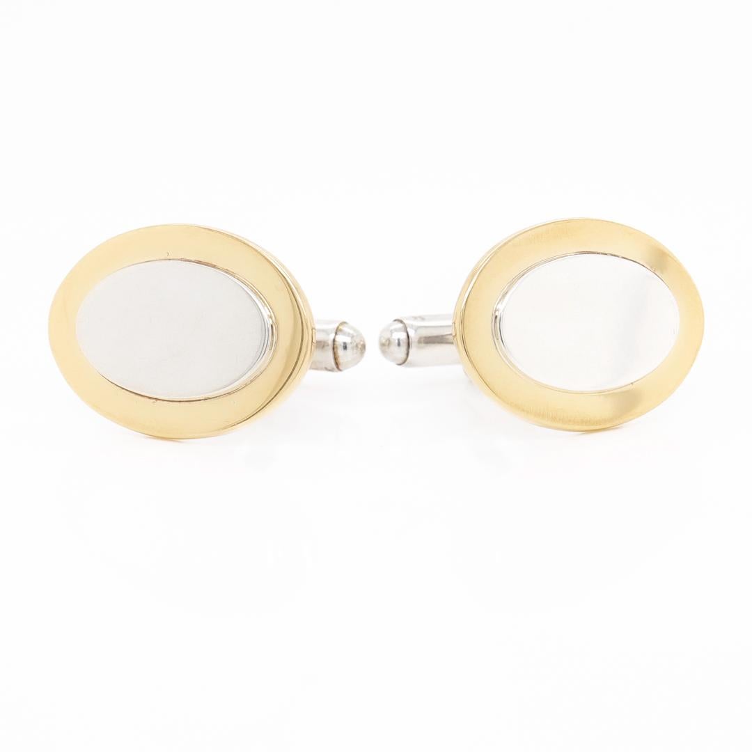 A fine pair Classic Oval cufflinks.  

By Tiffany & Co.

In sterling silver.

With smooth faces and toggle backs.  

Marked to the reverse: © TIFFANY & CO. / 18K ON STERLING 

Simply wonderful Tiffany design!

Date:
Late 20th Century or Early 21st