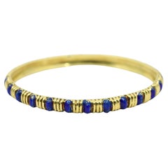 Brazalete Tiffany & Co. de oro de 18 quilates con esmalte azul texturizado
