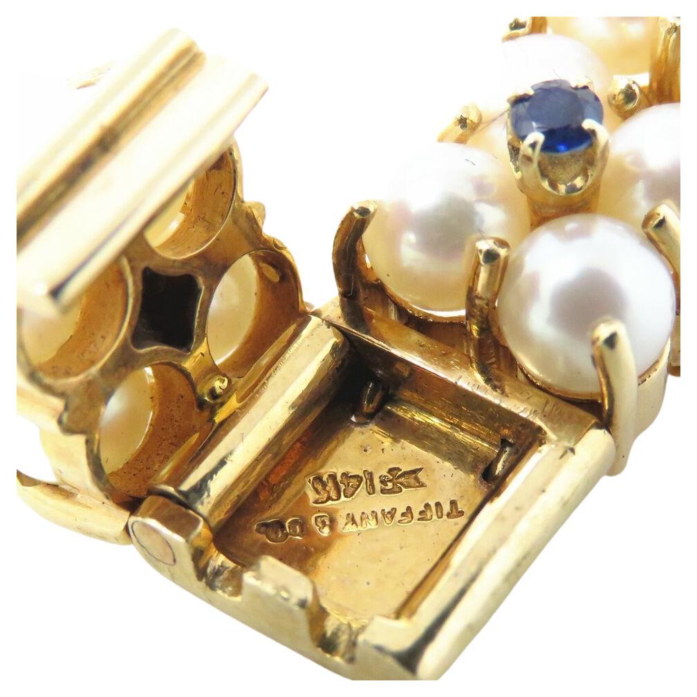 Stunning Tiffany & Co. 18k Gold Sapphires and pearls bracelet

Pearls 4.4-4.5mm

Marked: Tiffany & Co. 14k

Bracelet 9mm wide and 6.5 inches long

Total Weight : 37.3 grams








