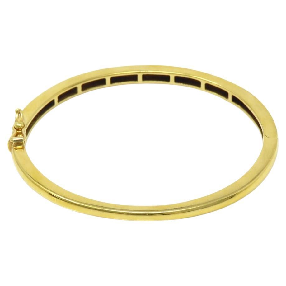 Wunderschönes Tiffany & Co. 18k Gold Armband mit Diamanten und blauen Saphiren
Ergänzen Sie Ihre Sammlung mit diesem exquisiten Goldarmband von Tiffany & Co., das mit funkelnden Diamanten und leuchtend blauen Saphiren verziert ist und Eleganz und