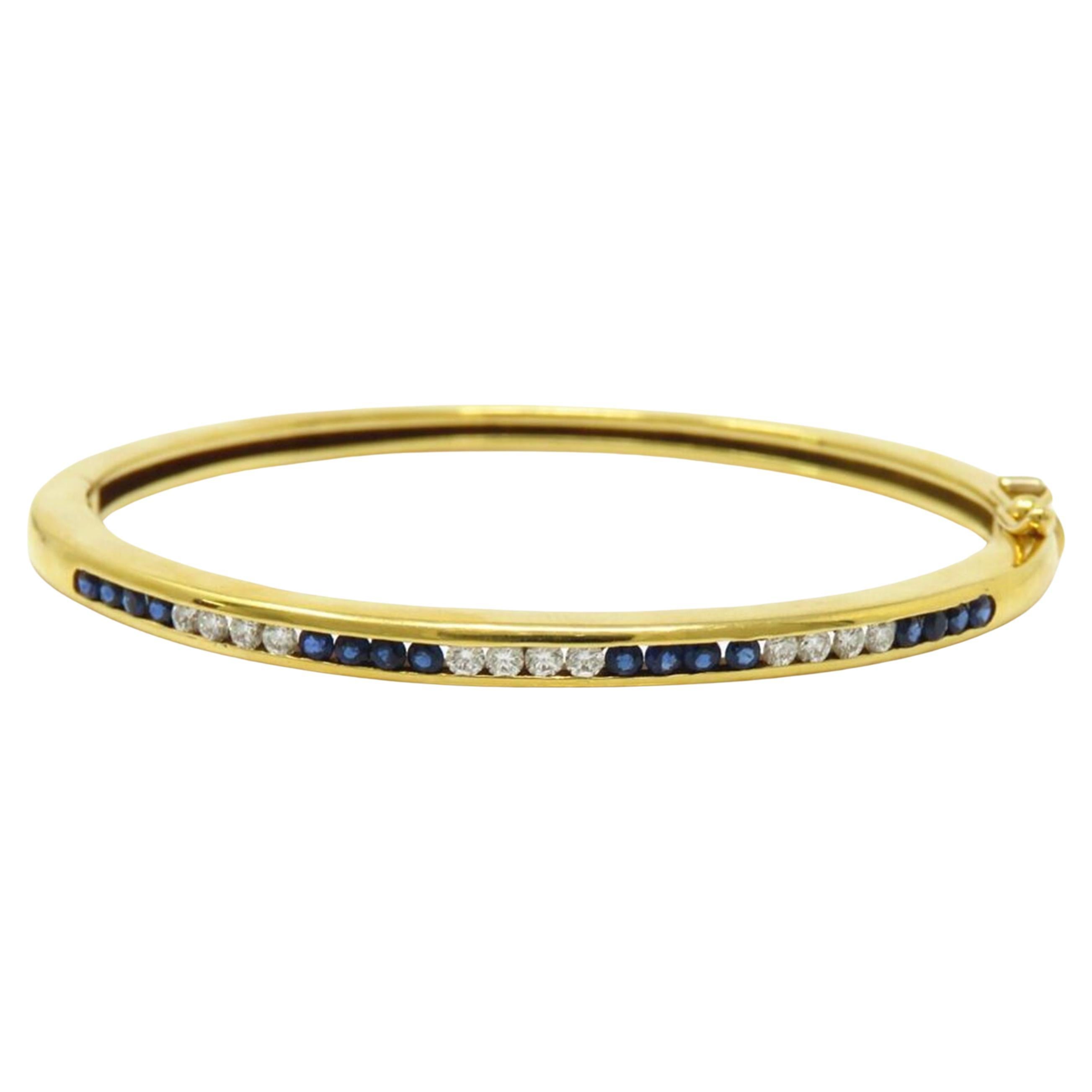Tiffany & Co. Armband aus 18 Karat Gold mit Diamanten und blauen Saphiren (Zeitgenössisch) im Angebot