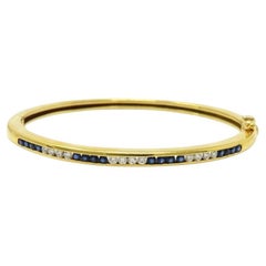 Tiffany & Co. 18k Gold Bracelet with Diamonds and Blue Sapphires