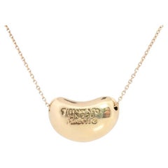 Tiffany & Co. Collier pendentif en forme de chaîne et de pomme en or 18 carats et or jaune 750
