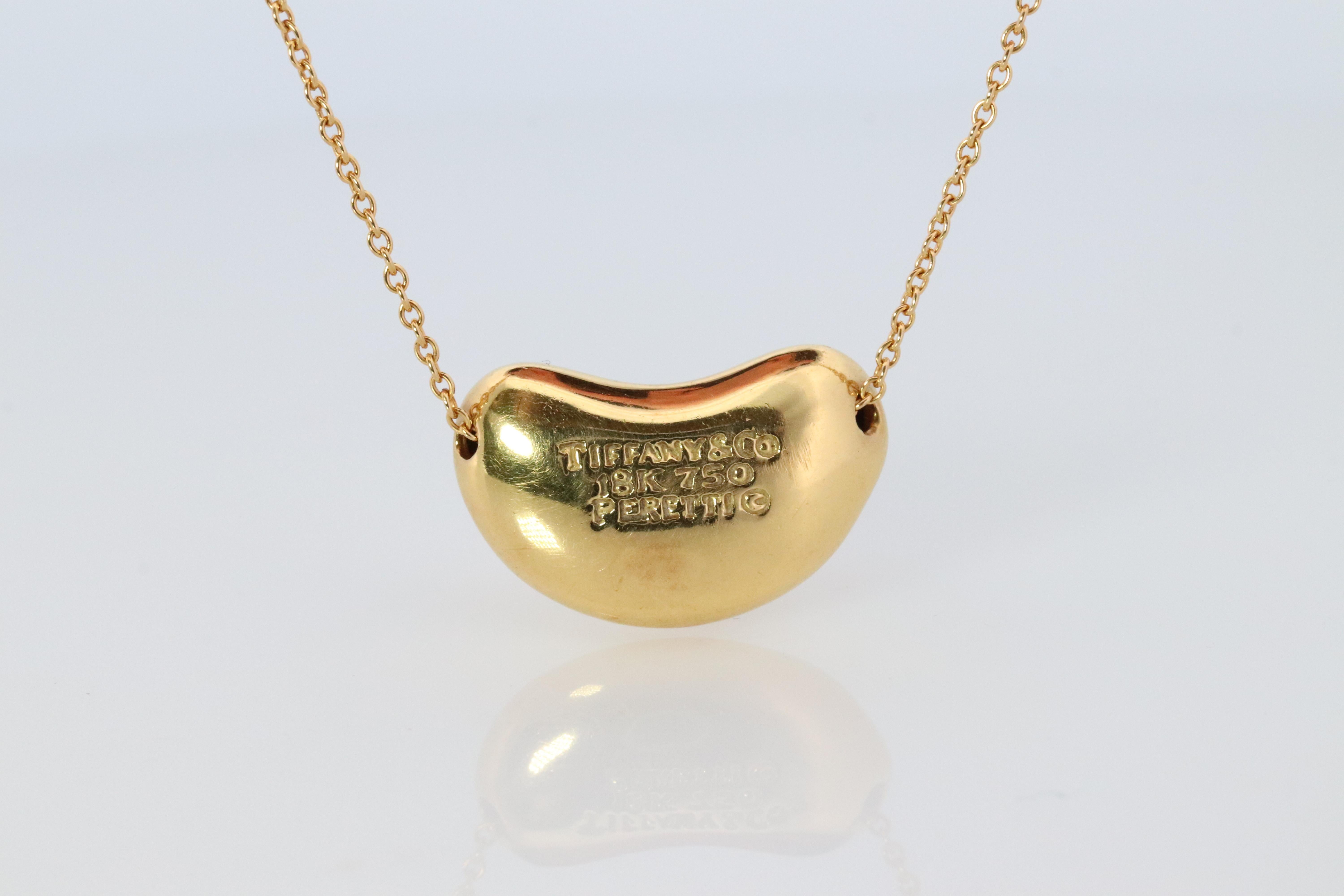 Women's Tiffany & Co. 18k Gold Chain and Bean Pendant Necklace. 750 Yellow Gold Tiffany