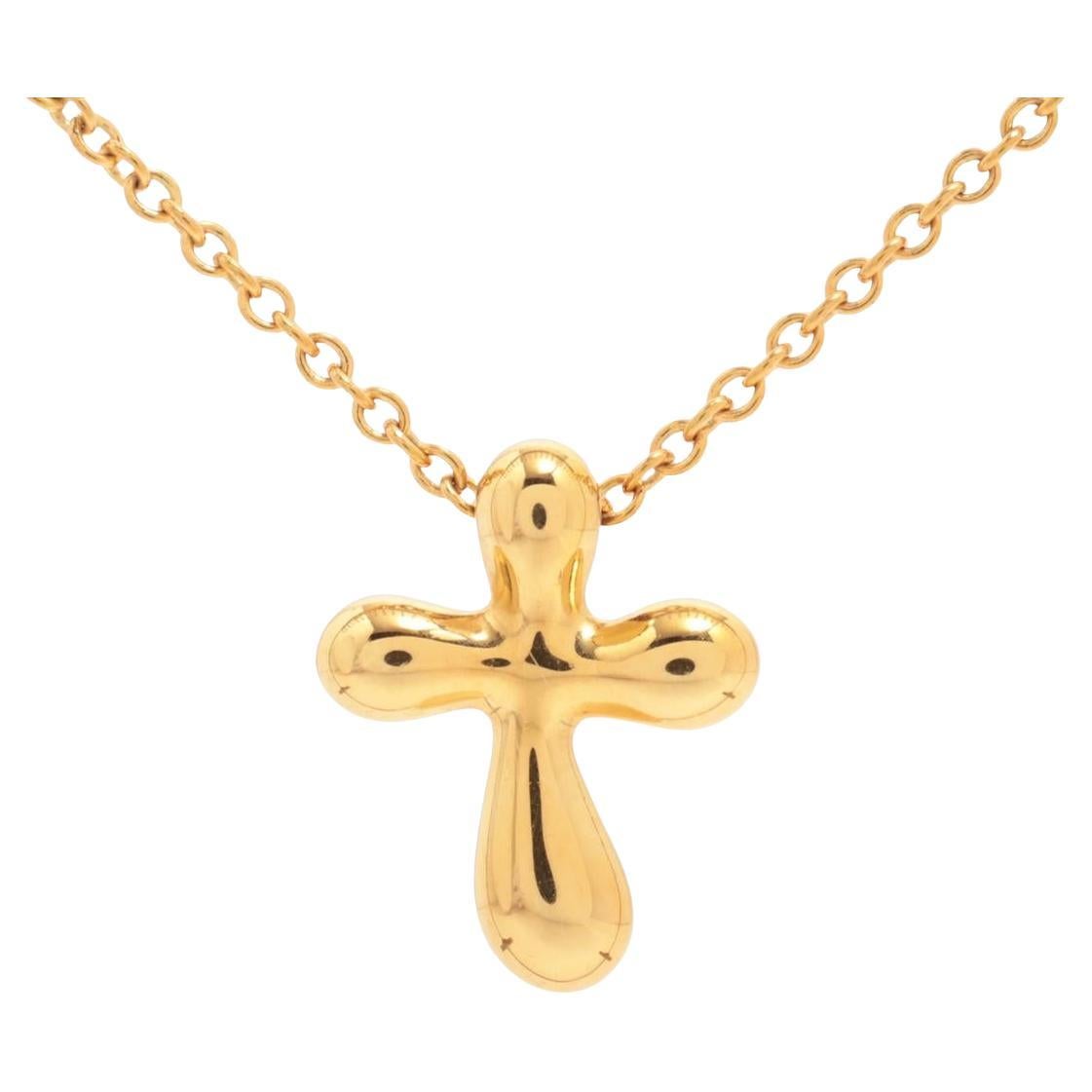 Tiffany & Co. Collier pendentif croix et chaîne en or 18 carats. Crucifix jaune 750