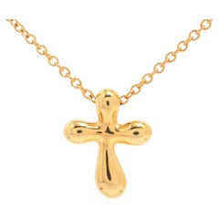 Tiffany & Co. Collier pendentif croix et chaîne en or 18 carats. Crucifix jaune 750