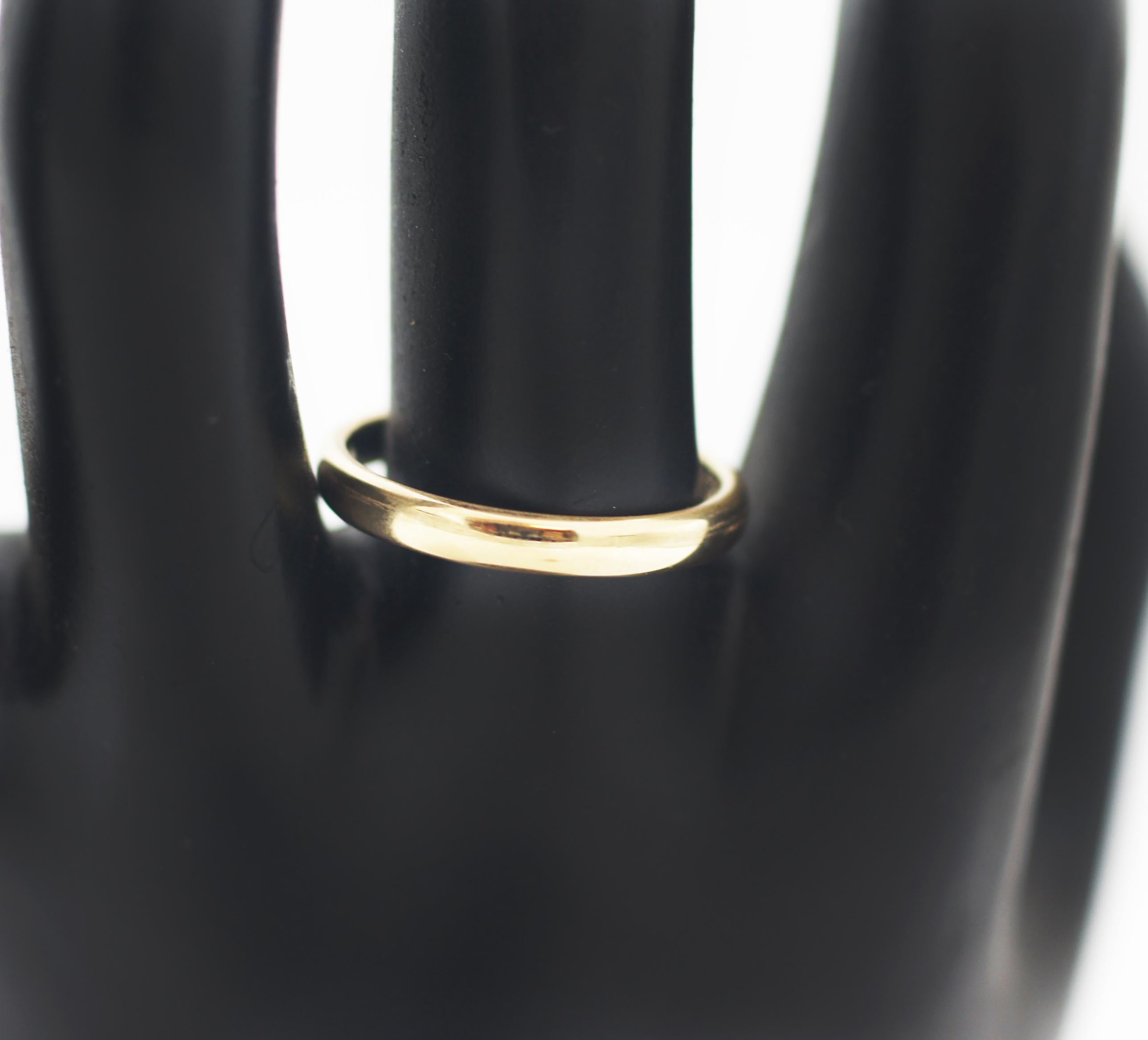 Tiffany & Co.
Classic Wedding Ring
18K Gold
Size 8.5
Internat Diameter 18.5mm
Hallmarked: (c) Tiffany & Co Au750
This beautiful pre-loved ring is in great looking condition. This ring has some wear which is consistent with time and some use such as