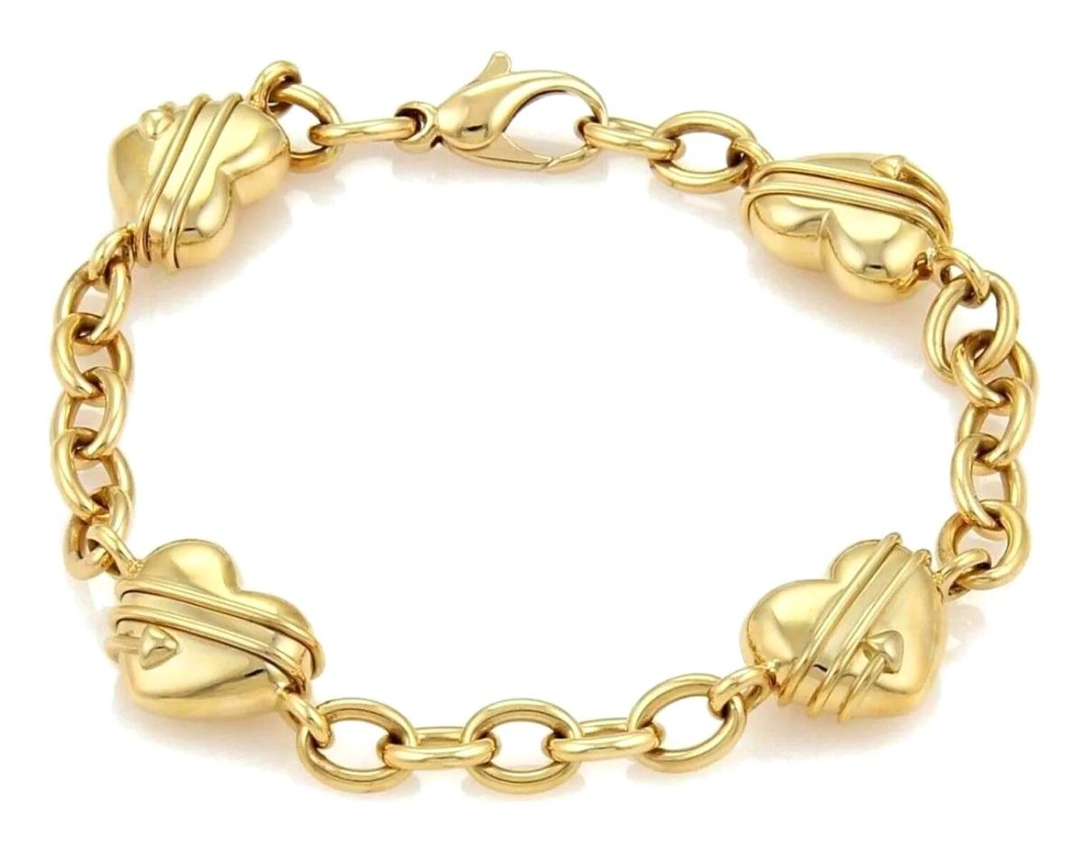 TIFFANY & Co. 18K Gold Cupid Arrow Heart Oval Link Bracelet

Metal: 18K gold
Length: 8