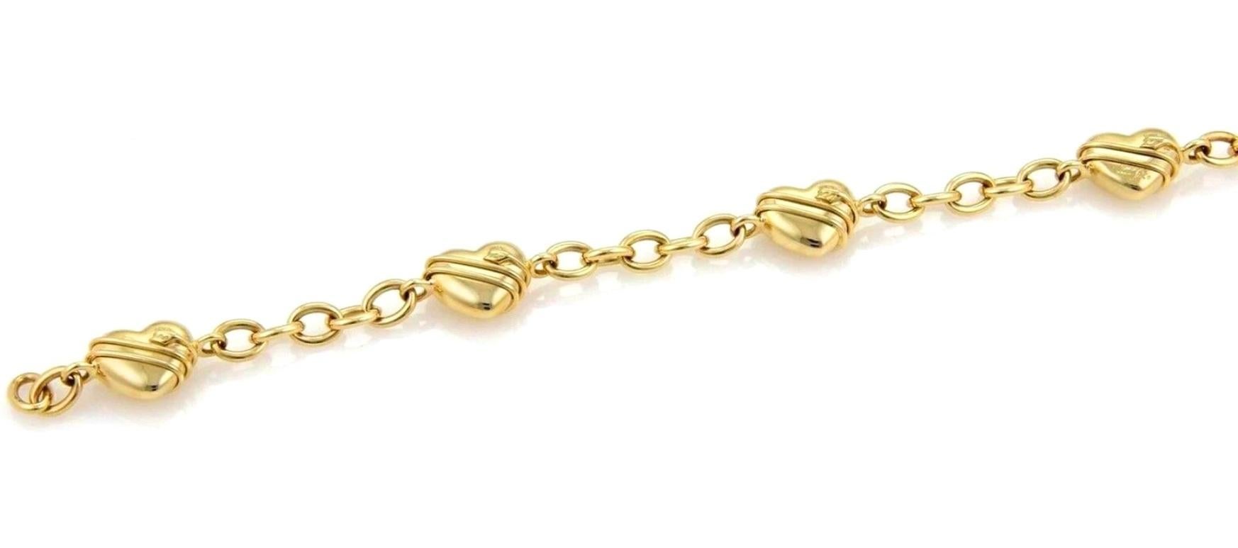 TIFFANY & Co. 18K Gold Cupid Arrow Heart Oval Link Bracelet 8
