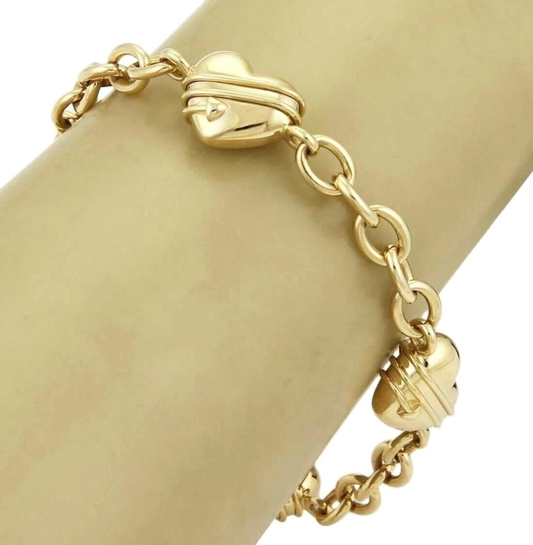 Women's TIFFANY & Co. 18K Gold Cupid Arrow Heart Oval Link Bracelet 8