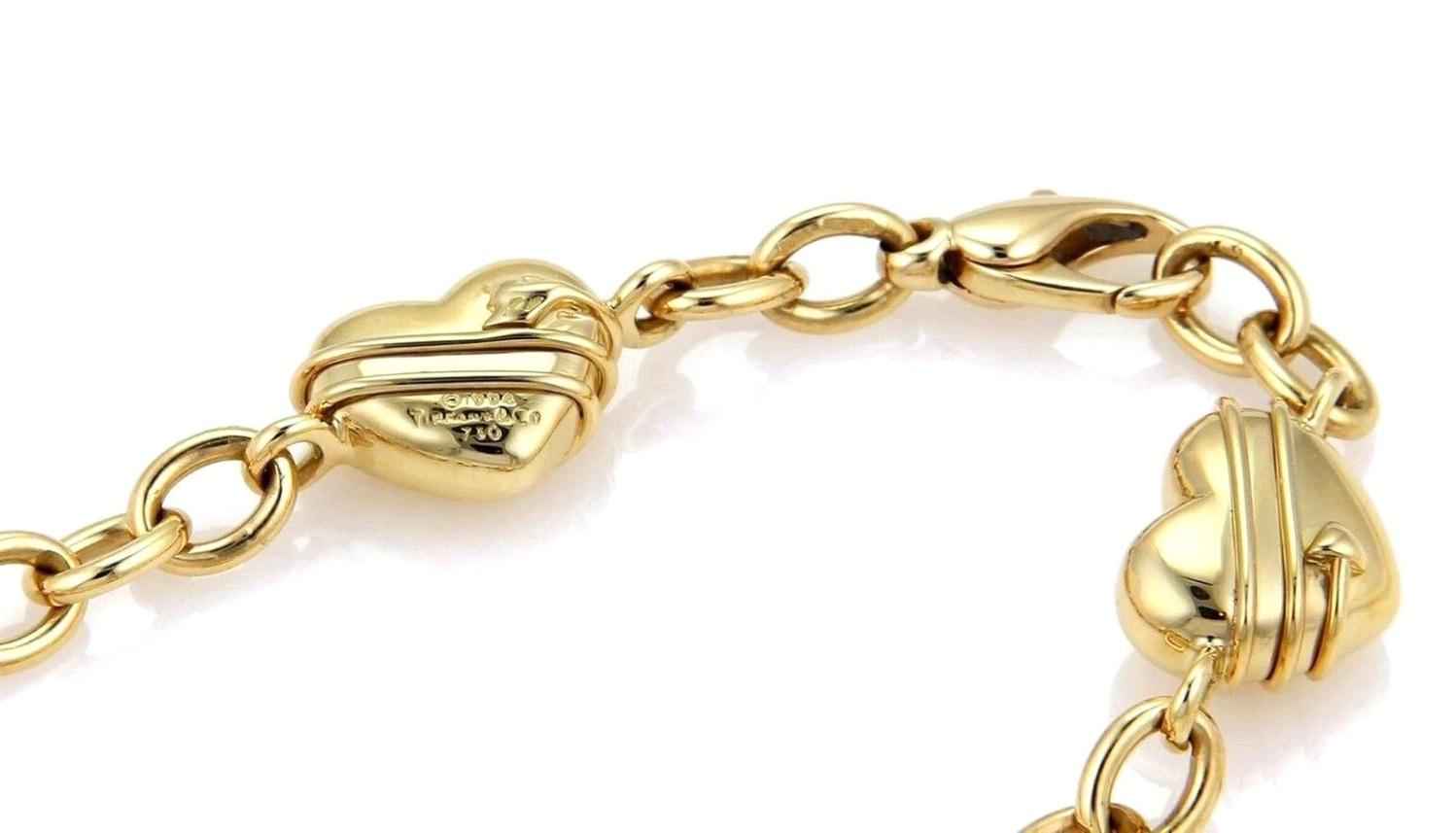 TIFFANY & Co. 18K Gold Cupid Arrow Heart Oval Link Bracelet 8