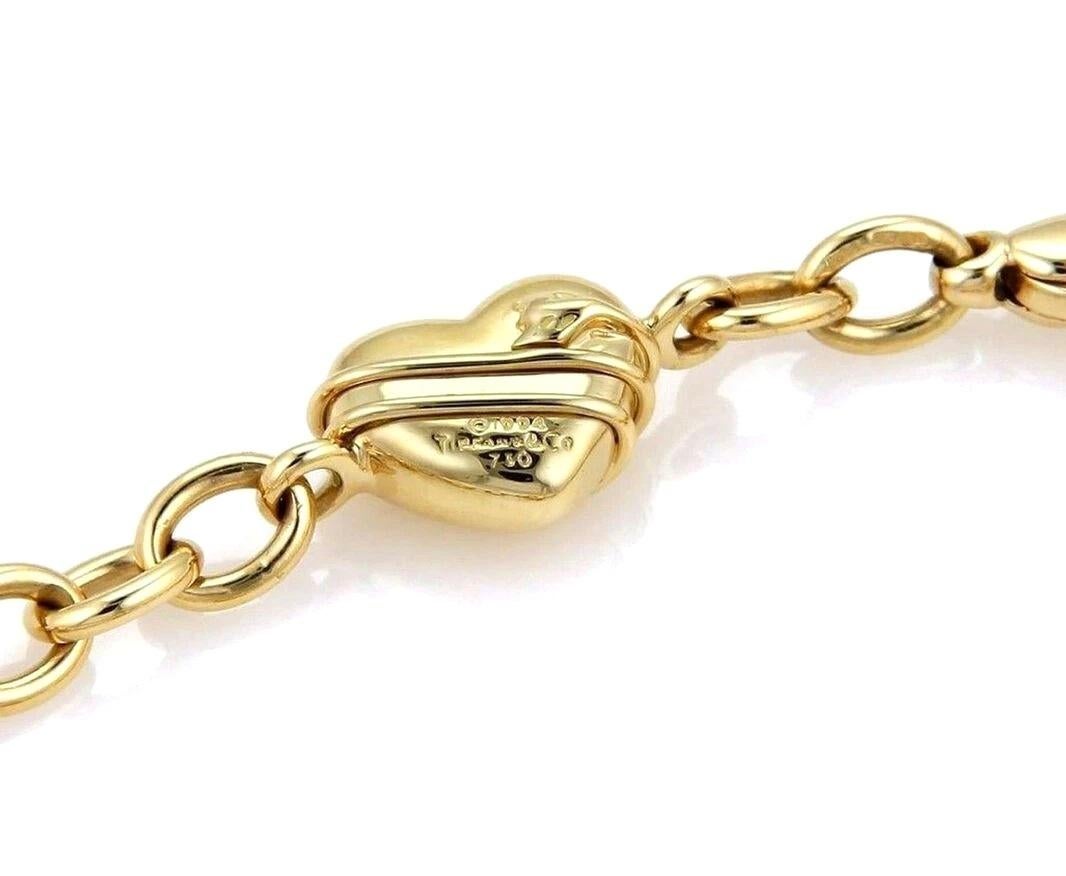 TIFFANY & Co. 18K Gold Cupid Arrow Heart Oval Link Bracelet 8
