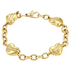 TIFFANY & Co. 18K Gold Cupid Arrow Heart Oval Link Bracelet 8"