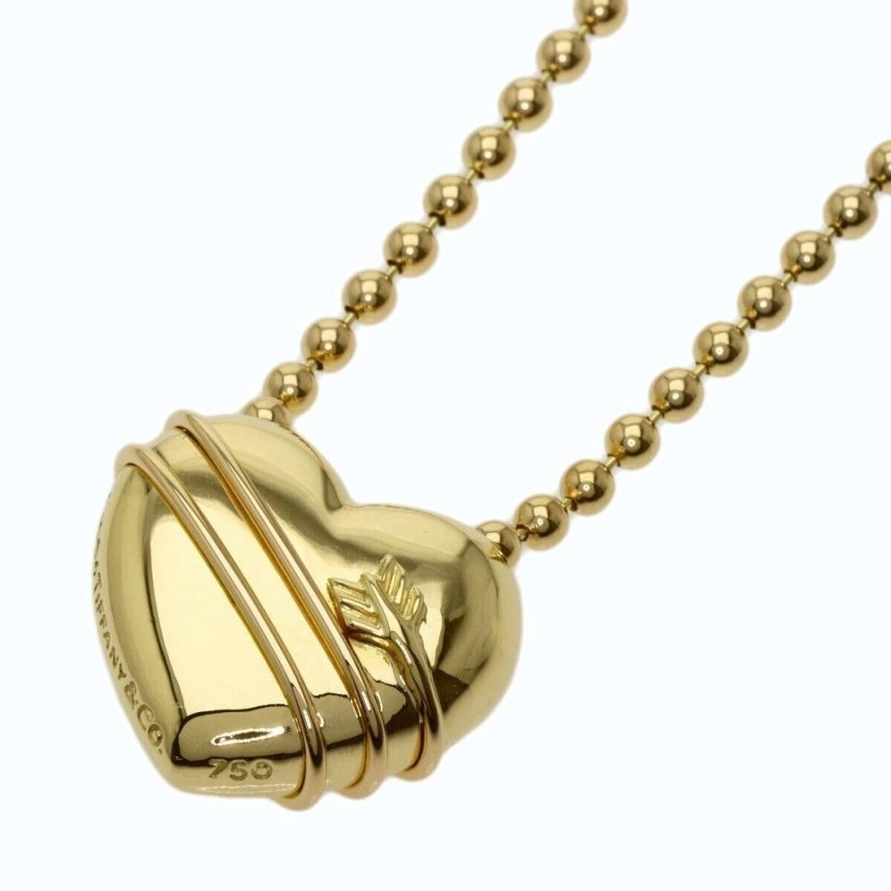 TIFFANY & Co. 18K Gold Cupid Arrow Heart Pendant Beaded Chain Necklace

Metal: 18K Yellow Gold
Chain: 18