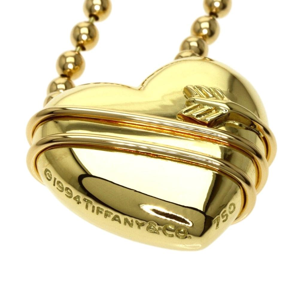 Women's TIFFANY & Co. 18K Gold Cupid Arrow Heart Pendant Beaded Chain Necklace For Sale
