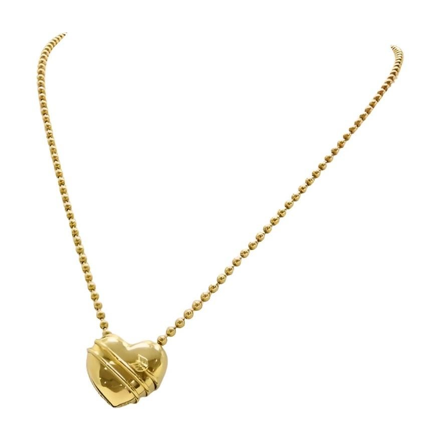 TIFFANY & Co. Collar de oro de 18 quilates con flecha de Cupido y colgante de corazón con cadena de cuentas en venta 3