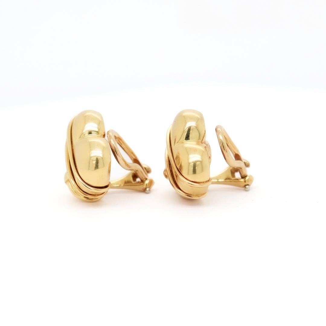 Tiffany & Co. 18K Gold Cupid Arrow Heart Shaped Clip Earrings In Good Condition For Sale In Philadelphia, PA