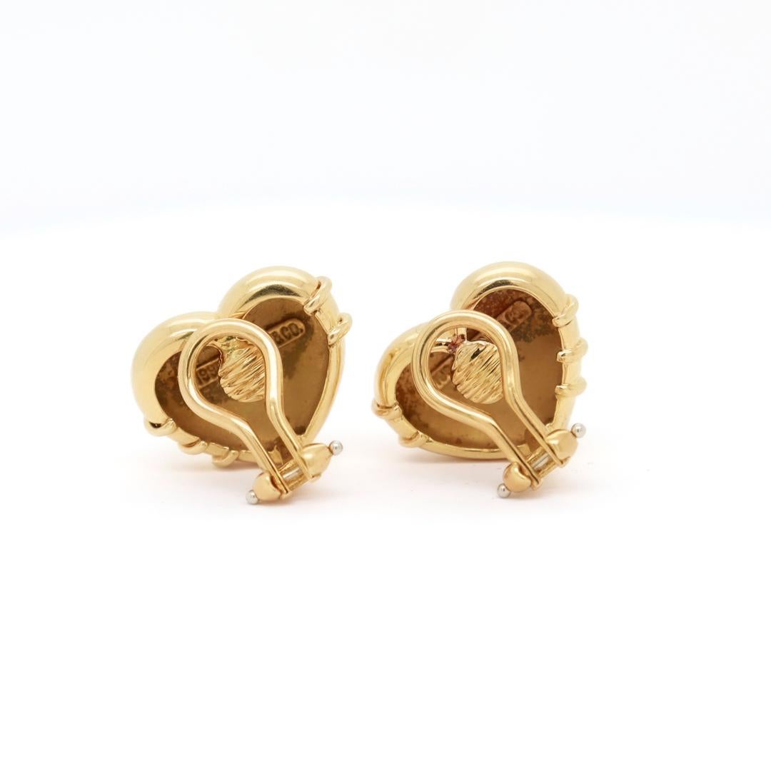 Women's Tiffany & Co. 18K Gold Cupid Arrow Heart Shaped Clip Earrings For Sale