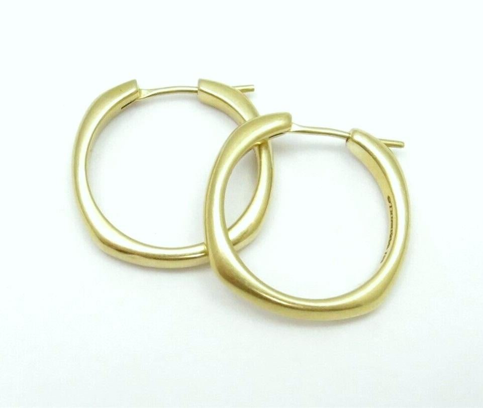 TIFFANY & Co. 18K Gold Cushion Hoop Earrings

Metal: 18K yellow gold
Measurements: 21mm wide x 21mm long
Weight: 9.90 grams
Hallmark: ©TIFFANY&Co. 750
Condition: Excellent condition, like new

Limited edition, no longer available for sale in Tiffany