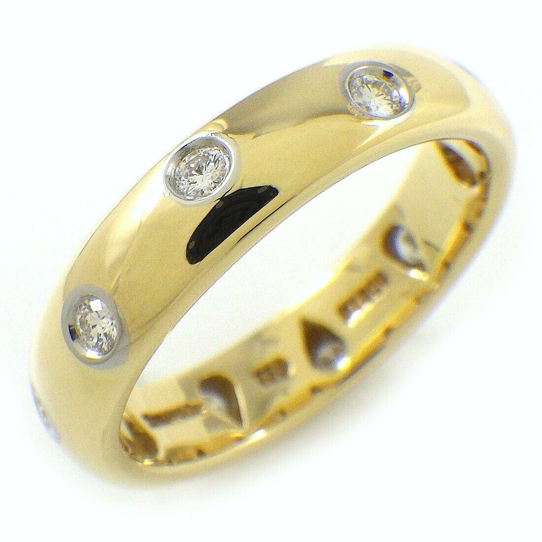 TIFFANY & Co. 18K Gold Diamond Etoile 4mm Band Ring 6.5

Metal: 18K Gold
Size: 6.5 
Band Width: 4mm
Diamond: 10 round brilliant diamonds, carat total weight .22
Hallmark: TIFFANY&CO. 750 PT950 
Condition: Excellent condition, like new

Authenticity