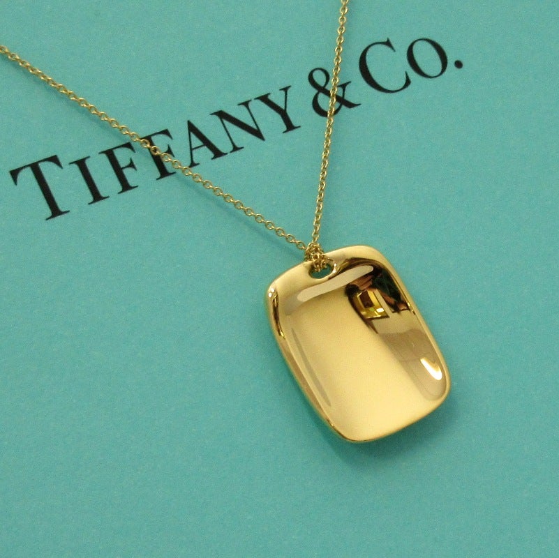TIFFANY & Co. Elsa Peretti 18K Gold Tag Pendant Necklace For Sale