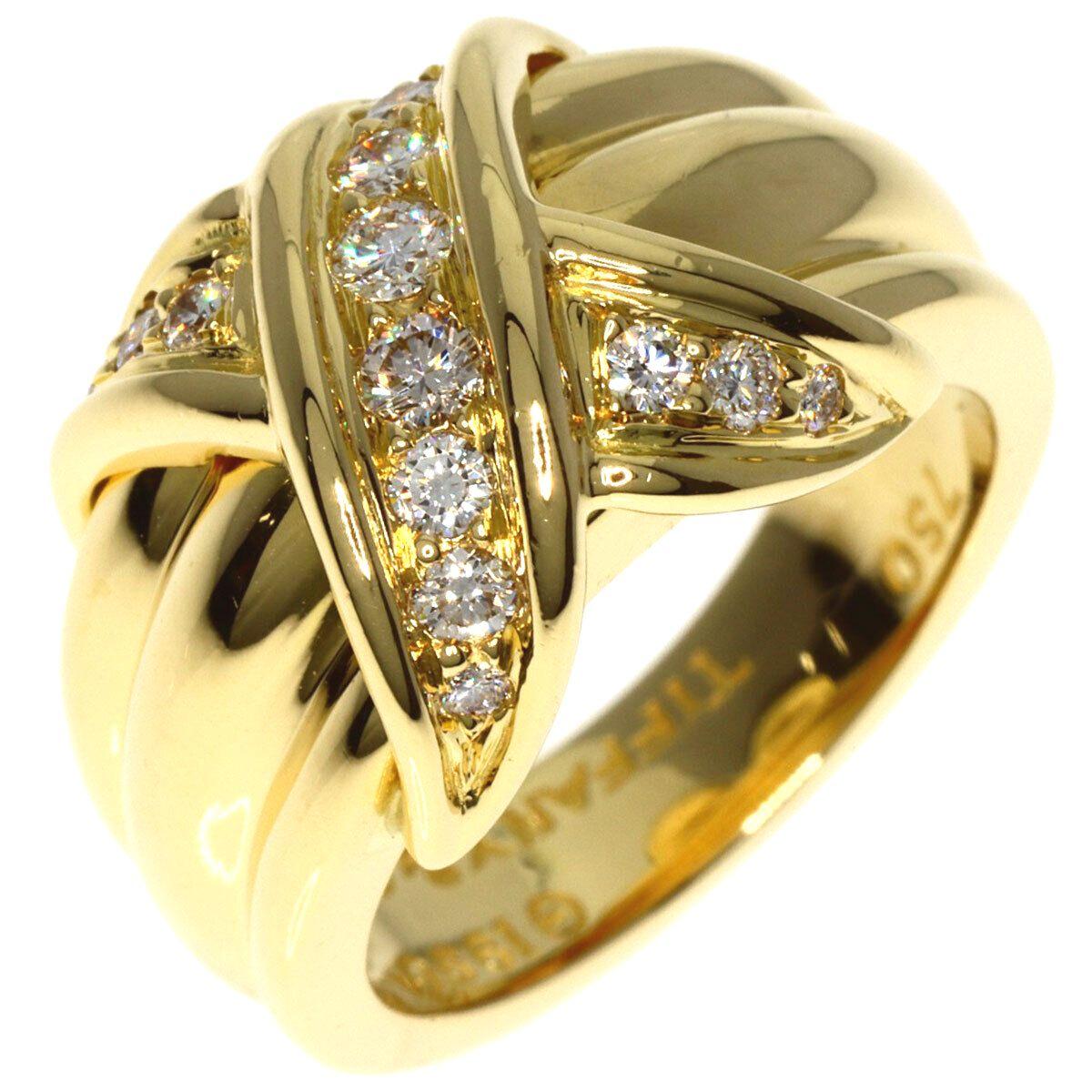 TIFFANY & Co. Or 18K Diamant Signature X Ring 5.5
 
 Métal : Or jaune 18K
 Taille : 5.5
 Largeur : 13 mm au point le plus large
 Poids : 10.0 grammes
 Diamant : 14 diamants ronds de taille brillant, poids total de 0,35 carat.
 Poinçon : 750 ©1990