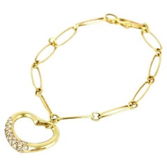 Tiffany & Co. 18k Gold Elsa Peretti .38 Carat Diamond Open Heart Charm Bracelet