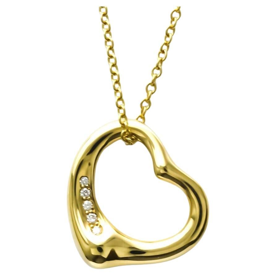 TIFFANY & Co. Elsa Peretti, collier pendentif cœur ouvert de 16 mm en or 18 carats avec 5 diamants 