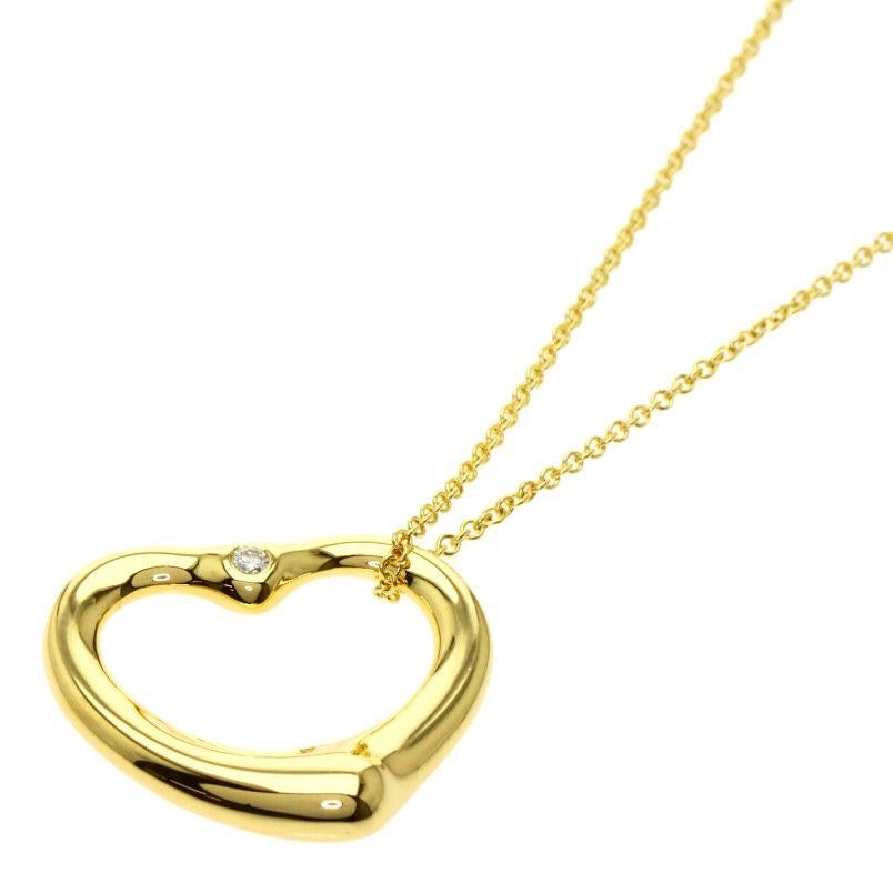 TIFFANY & Co. Elsa Peretti 18K Gold 1 Diamant 22mm offenes Herz Anhänger Halskette 

Metall: 18K Gelbgold
Gewicht: 7,70 Gramm 
Kette: 16