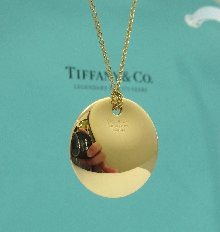 TIFFANY & Co. Elsa Peretti 18K Gold 24mm Round Pendant Necklace

Metal: 18K Yellow Gold
Necklace Length: 16