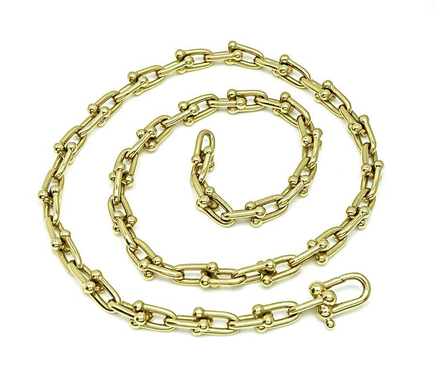 Si tratta di un'affascinante collana Hardwear in oro giallo 18 carati di Tiffany & Co. La collana misura 6 mm di larghezza e 17,75 pollici di lunghezza. La collana è firmata AT&T. Au750 ITALIA e pesa 36,2 grammi.