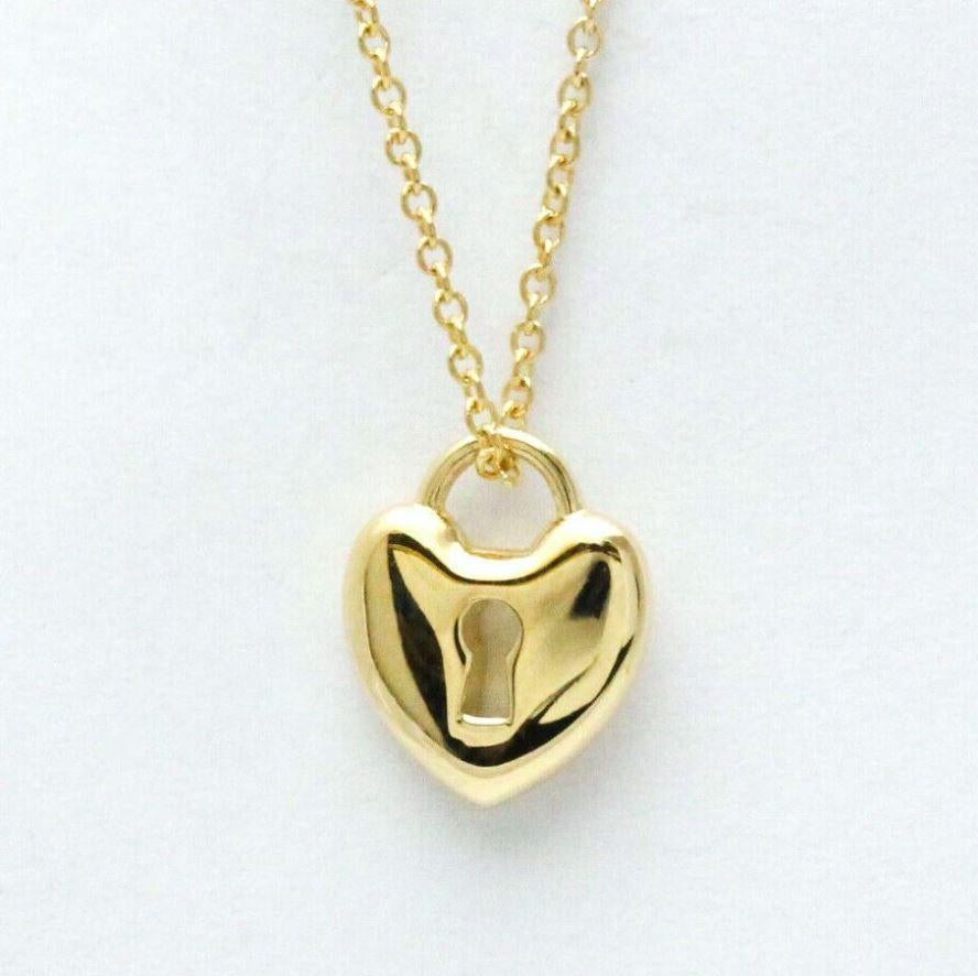 TIFFANY & Co. 18K Gold Heart Lock Pendant Necklace 

Metal: 18K Yellow Gold 
Chain: 16