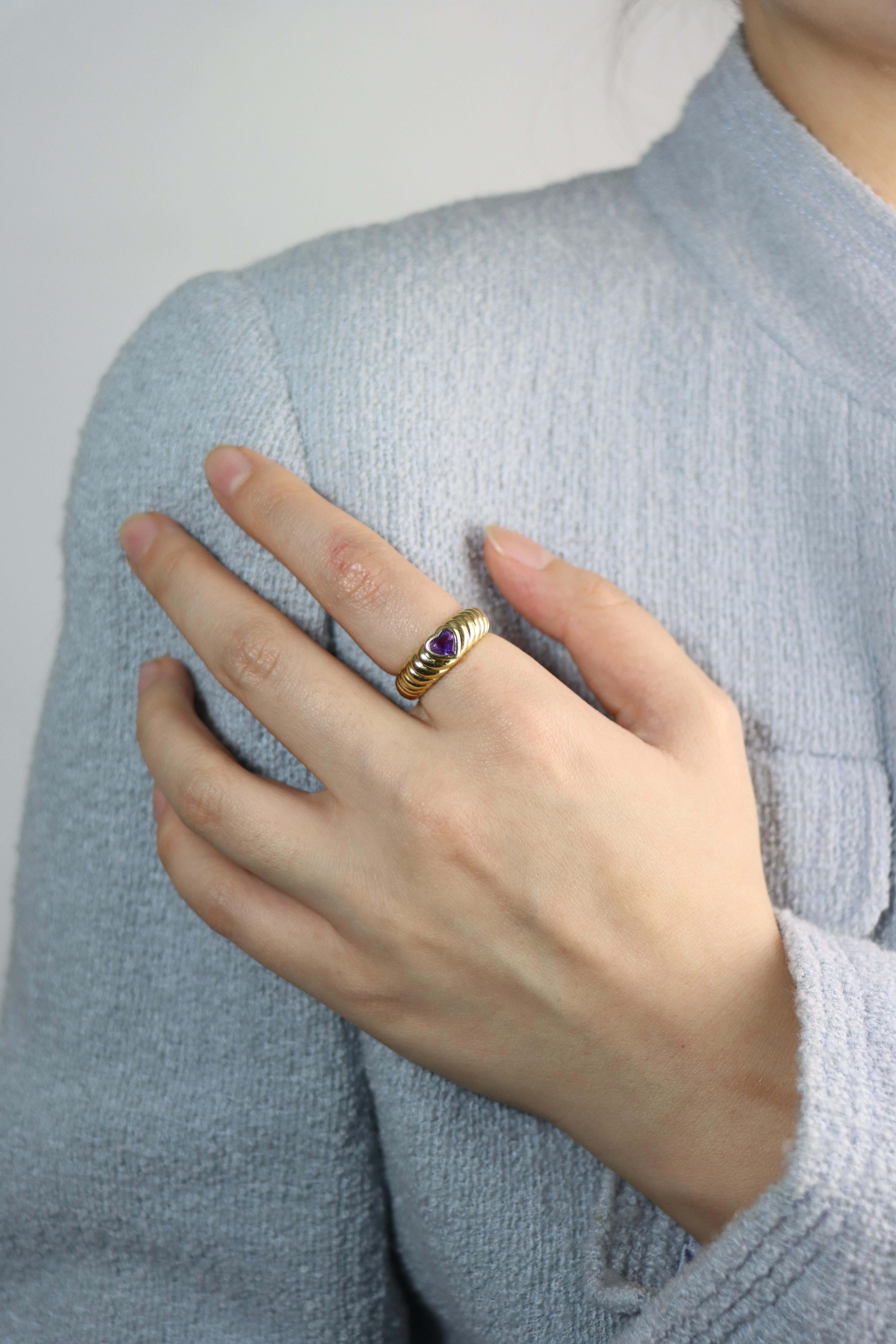 Tiffany & Co. 18K Gold Heart Shape Cut Amethyst Ring

Marked:
Tiffany & Co. 
750

Approximate Dimensions:
6.25  (Ring Size) 
5.8 grams in weight.