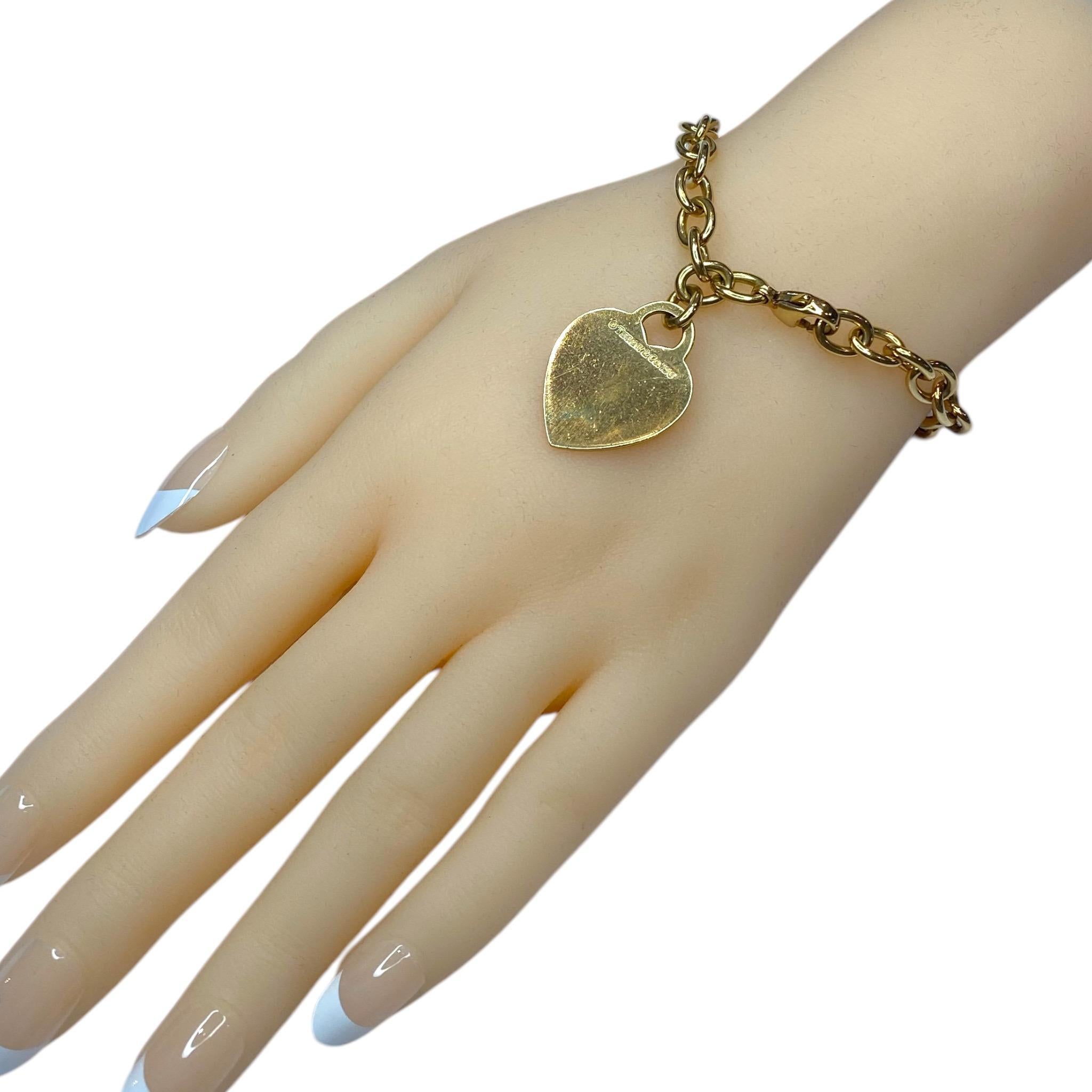 Contemporary TIFFANY & Co. 18K Gold Heart Tag Charm Bracelet 7