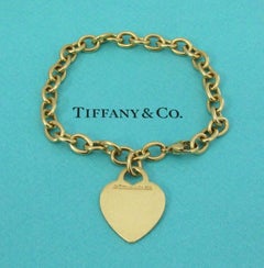 TIFFANY & Co. 18K Gold Heart Tag Charm Bracelet 8"