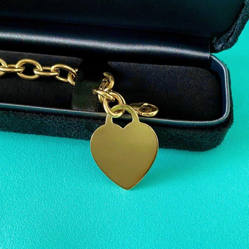 TIFFANY & Co. 18K Gold Heart Tag Charm Bracelet 7.25