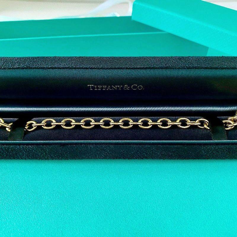 TIFFANY & Co. Bracelet à breloques en or 18 carats avec cœur 7.25