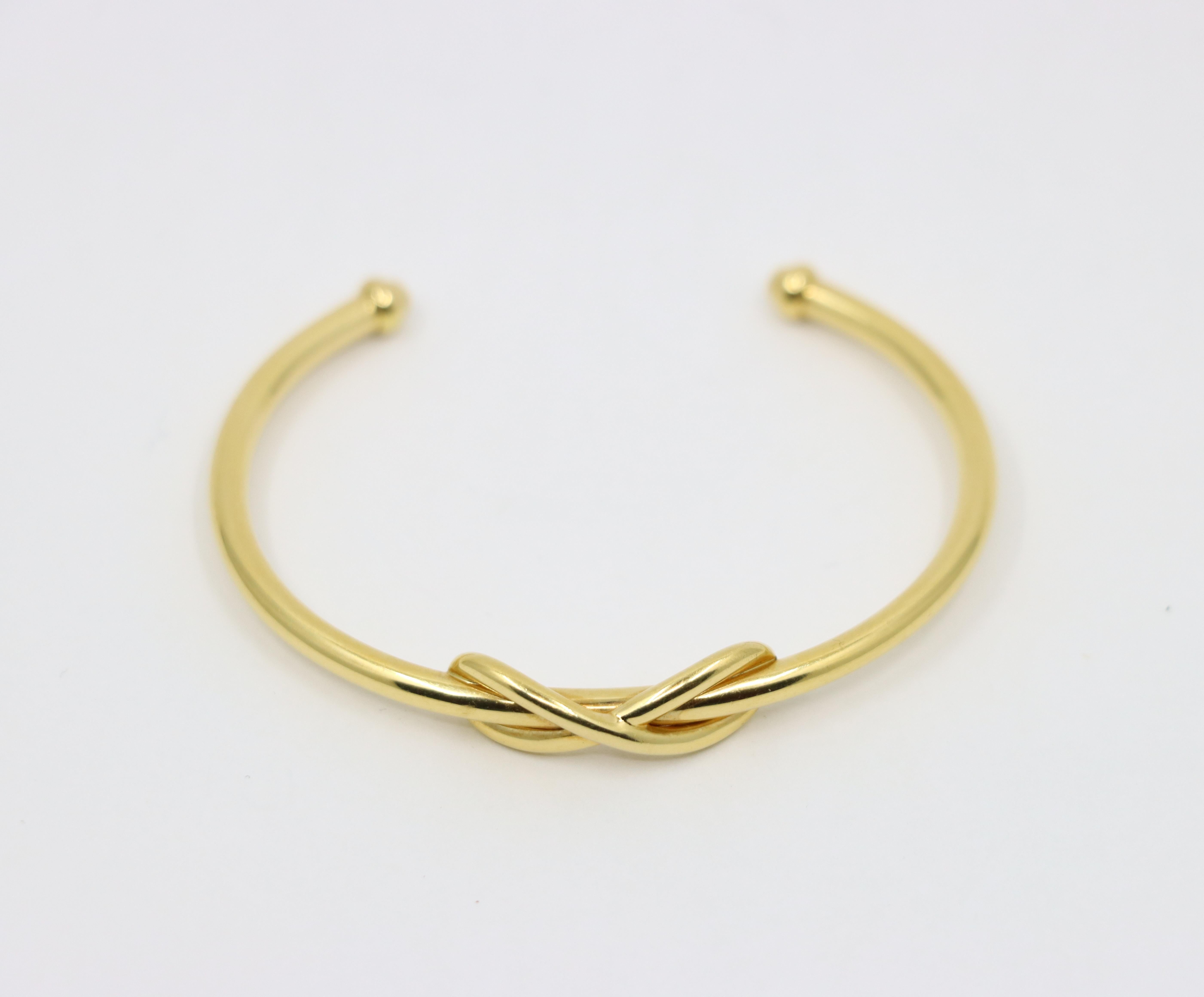 Women's or Men's Tiffany & Co. 18K Gold Infinity Cuff Bracelet For Sale