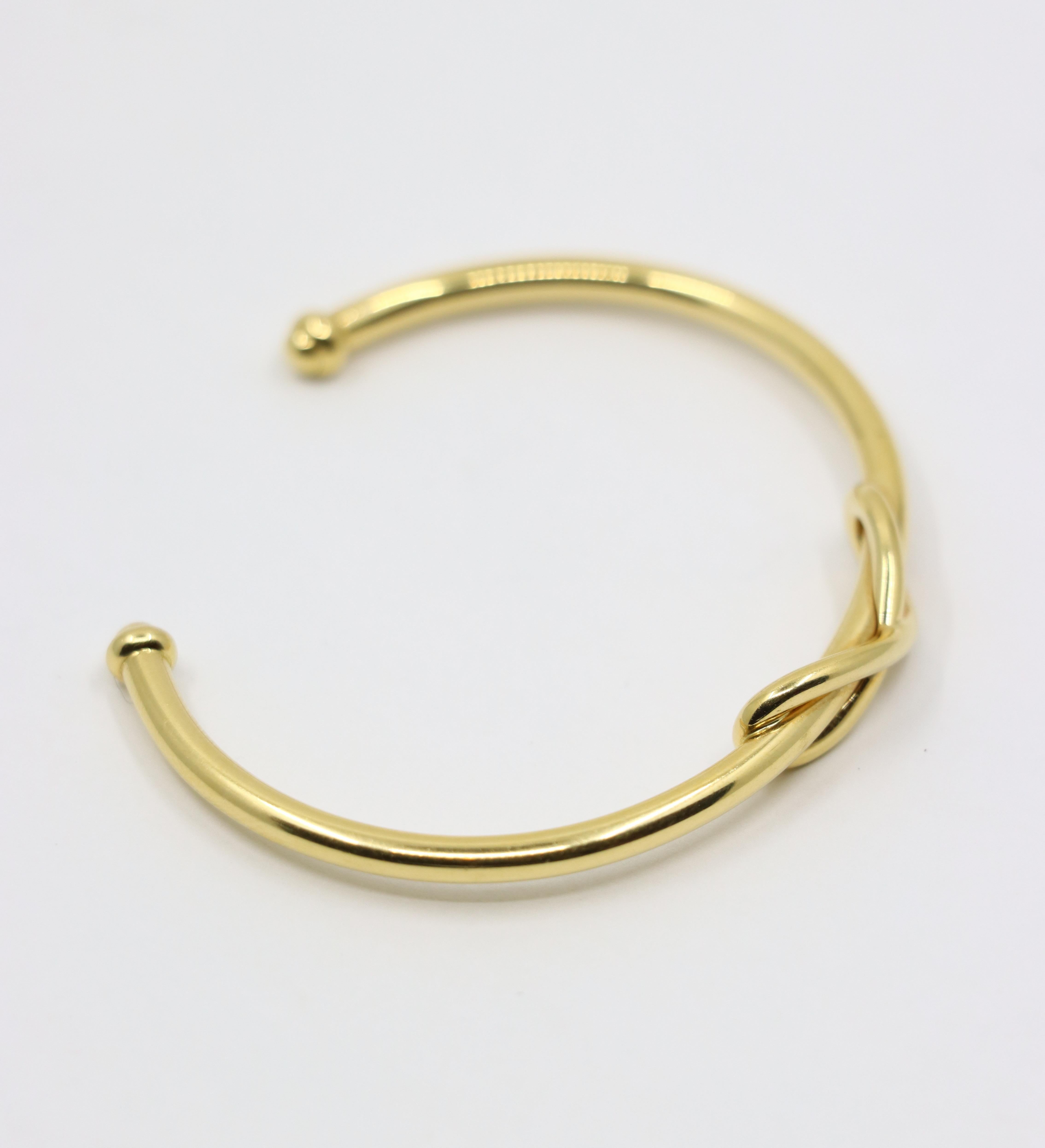 Tiffany & Co. 18K Gold Infinity Cuff Bracelet For Sale 1