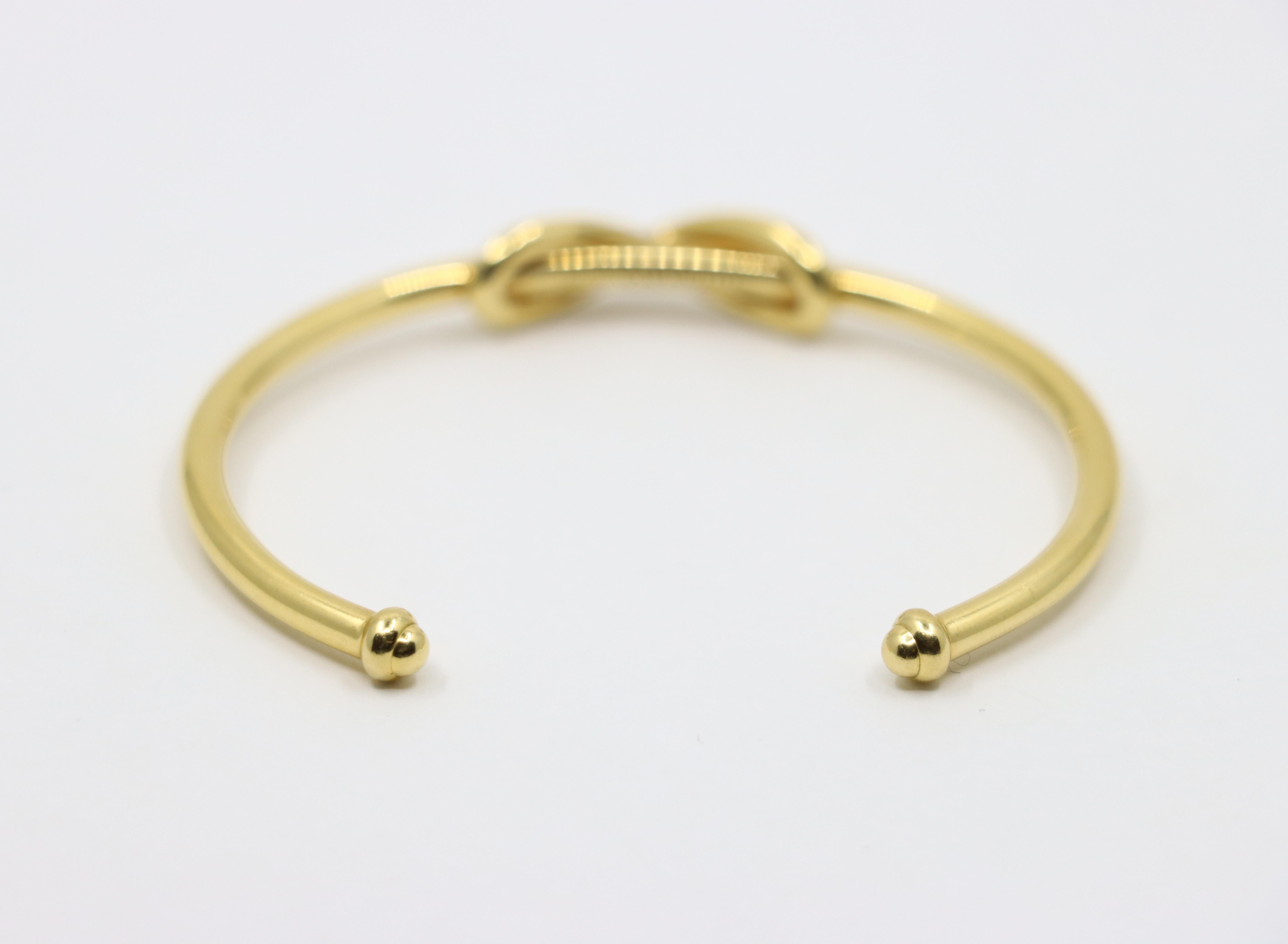 Tiffany & Co. 18K Gold Infinity Cuff Bracelet For Sale 2