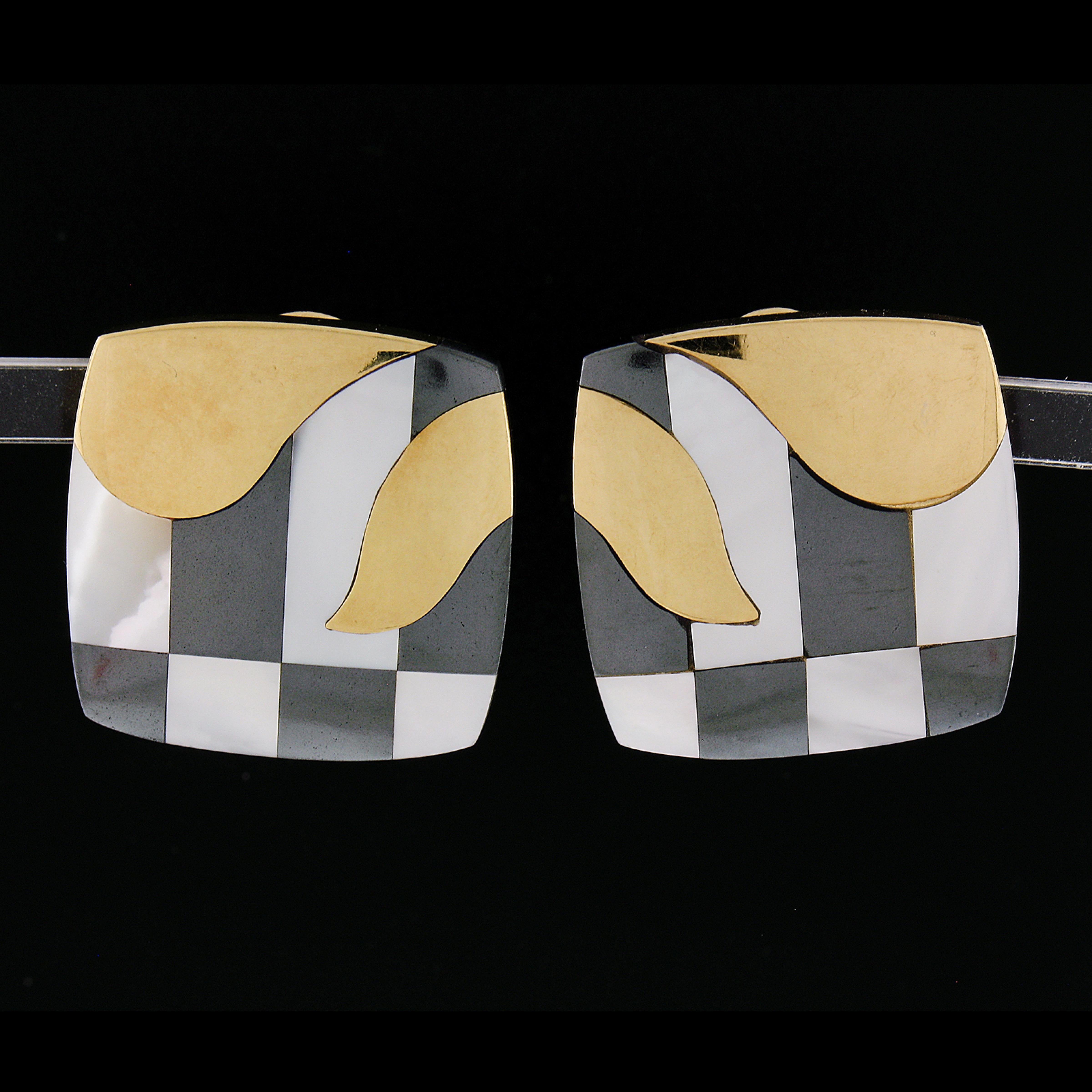 --Stone(s): --
Numerous Natural Genuine Hematite or Black Onyx & Mother of Pearl - Custom Cut - Inlaid Set - Black & White Color

Material: Solid 18k Yellow Gold
Weight: 20.69 Grams
Backing: Posts/ Omega Closures (Pierced ears are required)
Height: