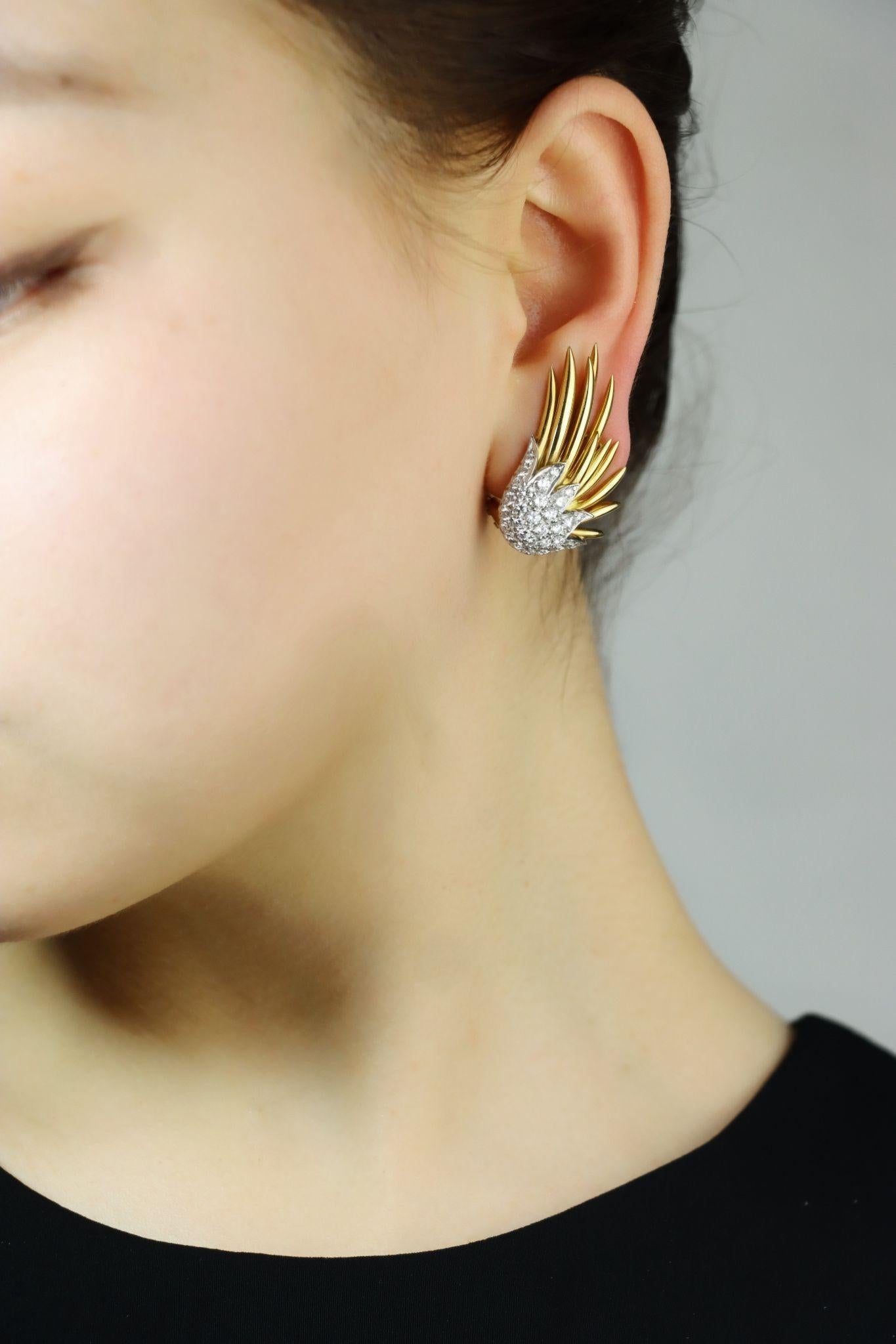 Tiffany & Co. 18K Gold Jean Schlumberger Flame Ear Clips

Marked:
TIFFANY
Schlumberger
18K

Approximate Dimensions:
3.5 cm (Length)
2 cm (Width)
Approx. 1.86 carats (Diamond)
21.5 grams in weight.

** All dimensions listed above are approximations