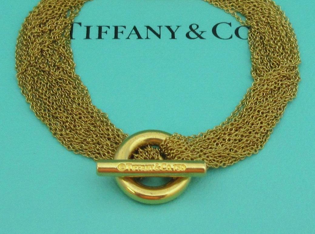 TIFFANY & Co. 18K Gold Multi Strand Mesh Circle Toggle Bracelet For Sale 3