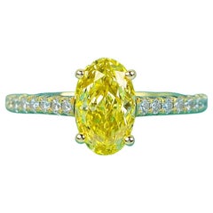 Tiffany & Co. 18K Gold Novo Fancy Vivid Yellow Oval Diamond Engagement Ring