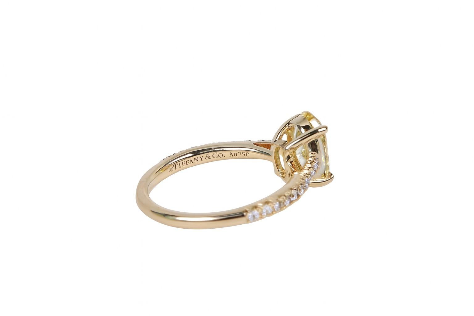 Tiffany & Co. 18K Gold Novo Fancy Vivid Yellow Oval Diamond Engagement Ring In Excellent Condition For Sale In Chicago, IL