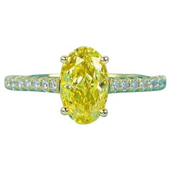 Tiffany & Co. 18K Gold Novo Fancy Vivid Yellow Oval Diamond Engagement Ring