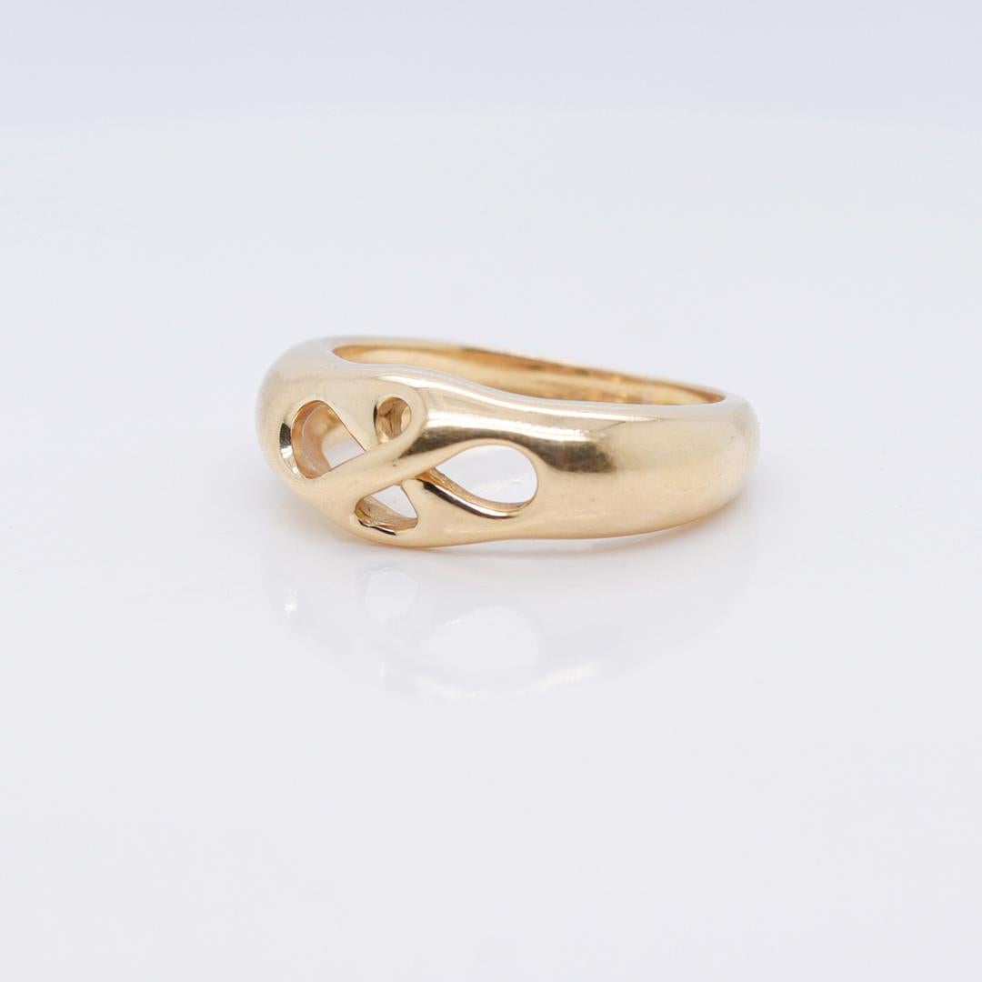 Tiffany & Co., bague jonc nœud d'amour ajourée en or 18 carats Unisexe en vente