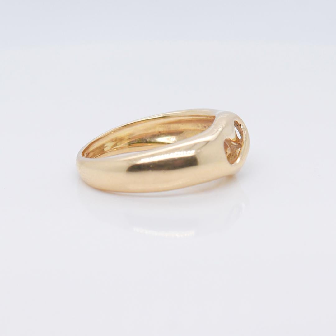Tiffany & Co., bague jonc nœud d'amour ajourée en or 18 carats en vente 3